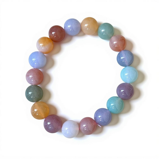 High grade natural 12 mm multicoloured agate bracelet with pastel tones. Known for grounding and balancing energy.