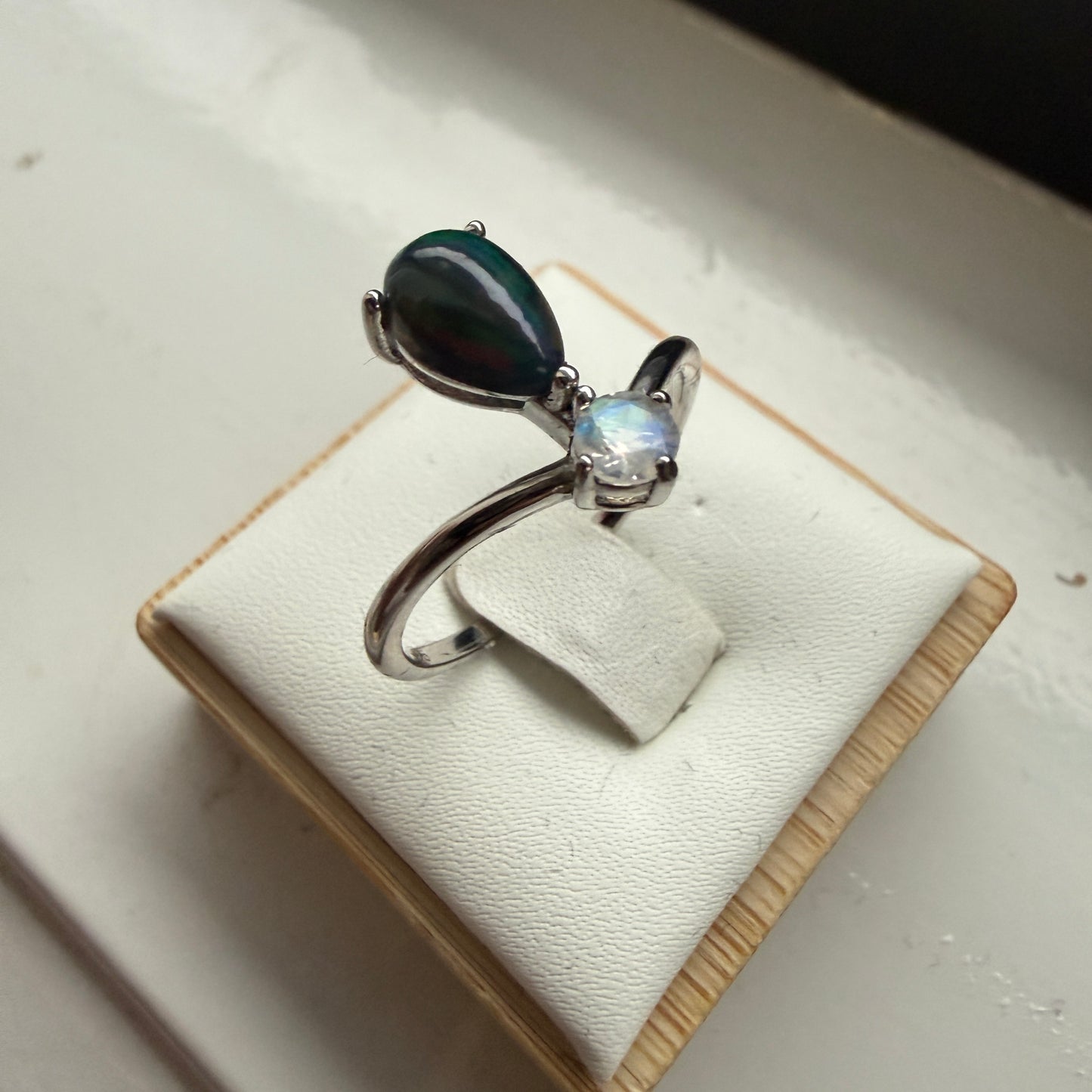 Black Opal and Rainbow Moonstone Ring on sterling silver, size 9.