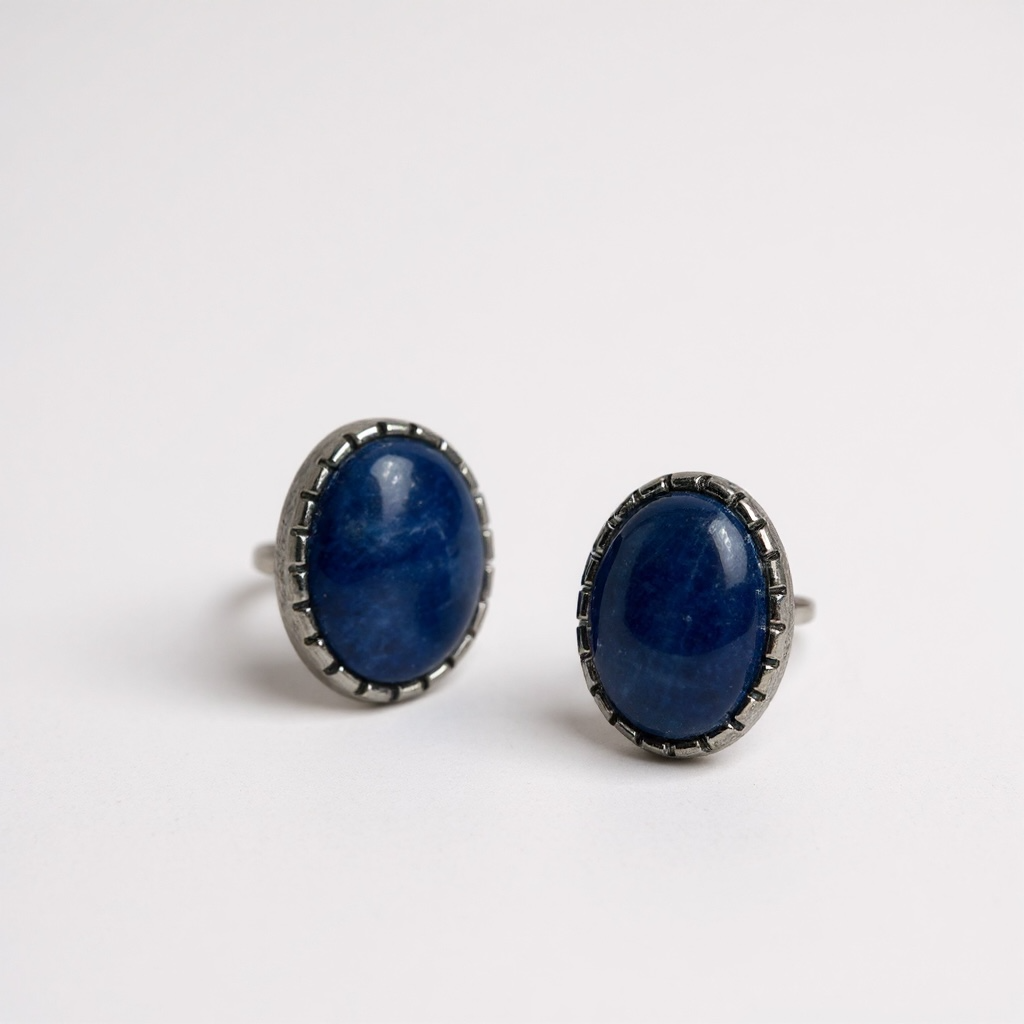 Oval kyanite stud earrings in white alloy — deep blue, lightweight, and easy to wear.