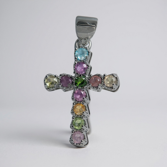 Rainbow watermelon tourmaline cross pendant in polished alloy. Colours vary naturally. A soft, symbolic piece of hope and balance.
